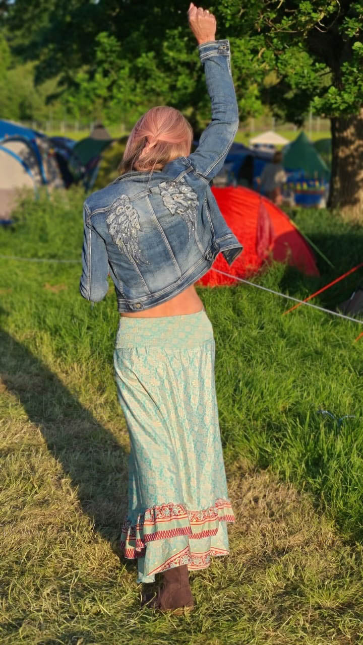 Blue & Bear Owner, Ruth Willson, in a boho festival field.  Blue & Bear Essential Oil Products are perfect to create a boho,  funky vibe to scent your home.