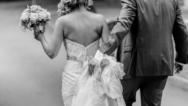 Bride and Groom walking away - Blue & Bear create beautiful bespoke wedding favours for your guests crafted with the purest essential oils