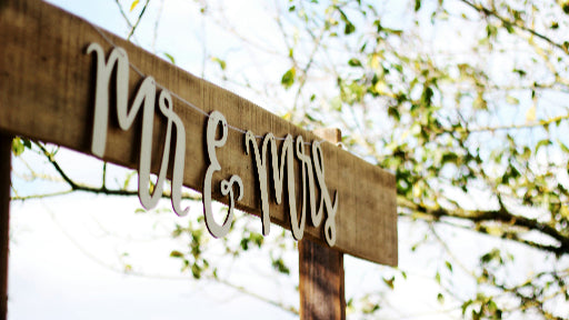 Wooden Mrs & Mrs sign in wedding venue - Blue & Bear create beautiful bespoke wedding favours for your guests crafted with the purest essential oils