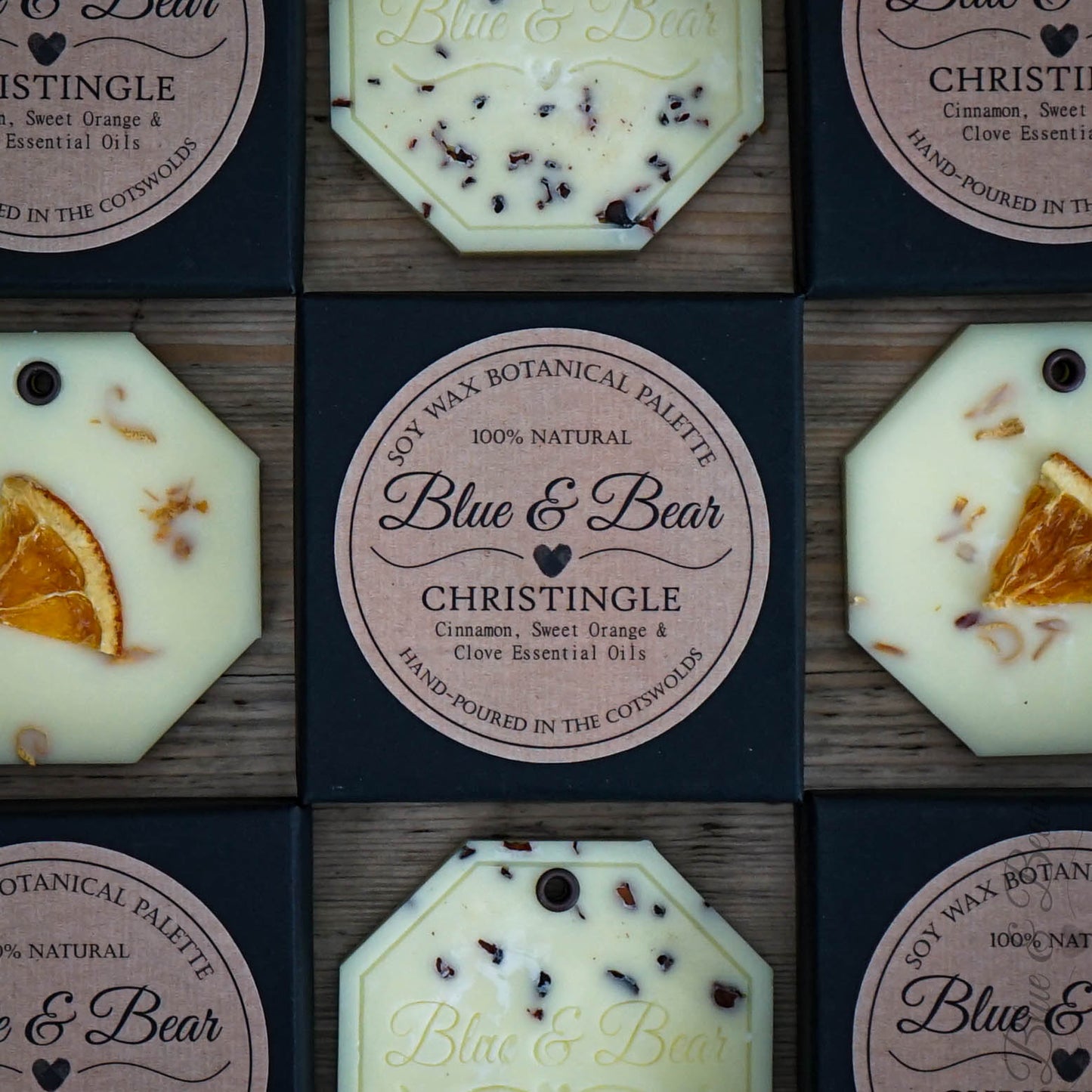 Close-up view Natural Soy Wax Botanical Palette CHRISTINGLE - Cinnamon, Clove, and Sweet Orange - cosy christmas aroma