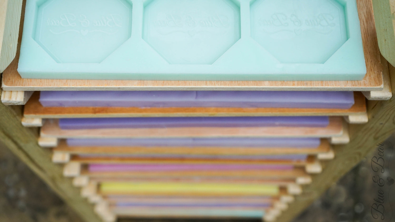 A curing rack full of Blue & Bear Botanical Palette moulds air-drying naurally.  All our products are hand-crafted in small batches in our Cotswold workshop.