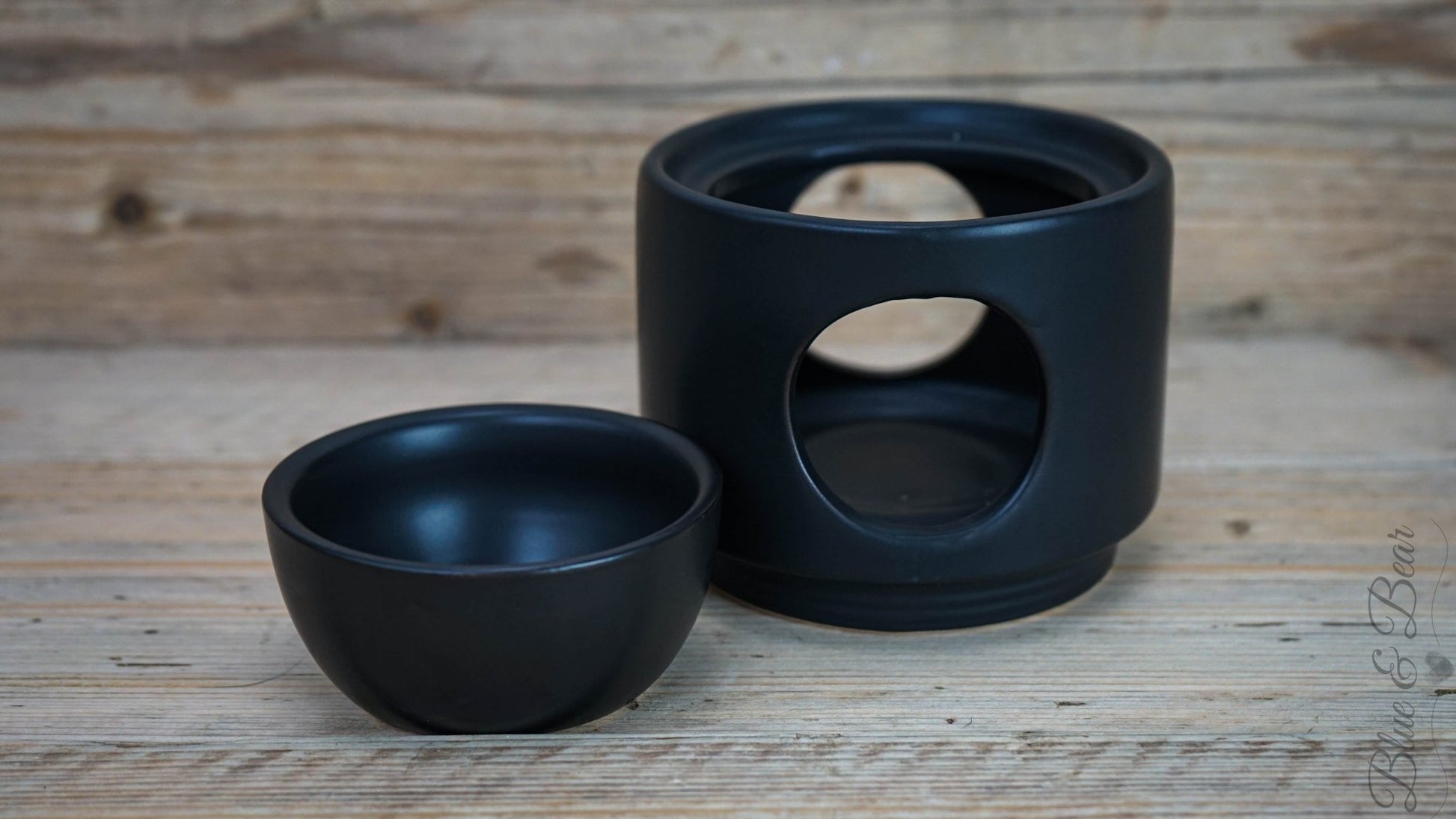 Black Ceramic Wax and Oil Burner from Blue & Bear, showing it's removeable bow.  Perfect for using with Botanical Palettes and Pure Essential Oils.