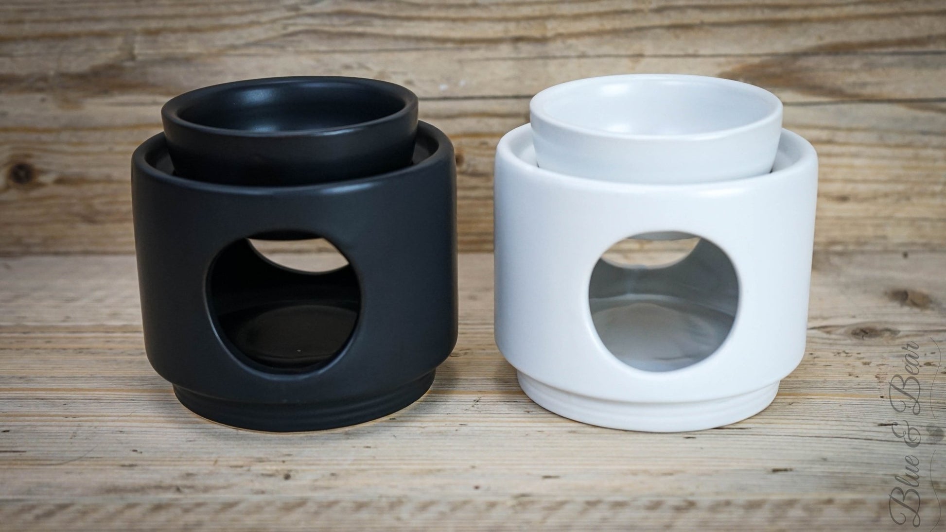 Black and White Ceramic Wax and Oil Burners from Blue & Bear side-by-side.  Perfect for using with Botanical Palettes and Pure Essential Oils.