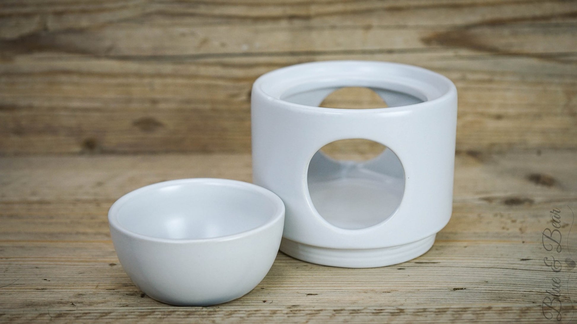 White Ceramic Wax and Oil Burner from Blue & Bear, showing it's removeable bow.  Perfect for using with Botanical Palettes and Pure Essential Oils.