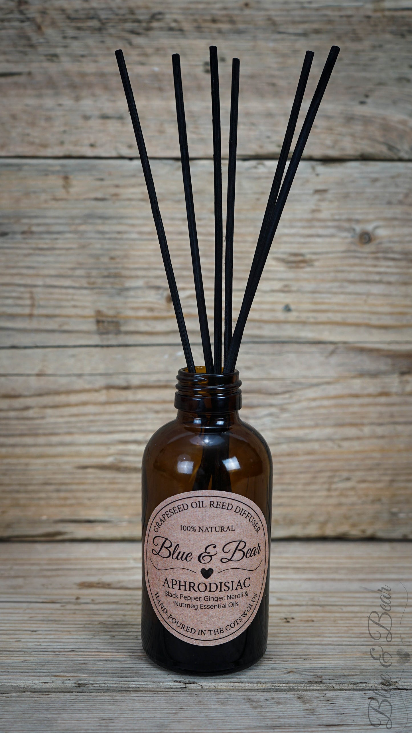 Open Bottle with Reeds Natural Reed Diffuser APHRODISIAC - Pepper, Neroli, Ginger, and Nutmeg - intoxicating and sensual