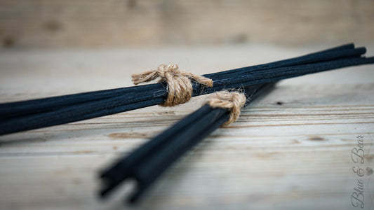 Two bundles of six thick black rattan reeds tied with jute string.  The perfect replacement to refresh your Blue & Bear  Essential Oil Reed Diffuser.