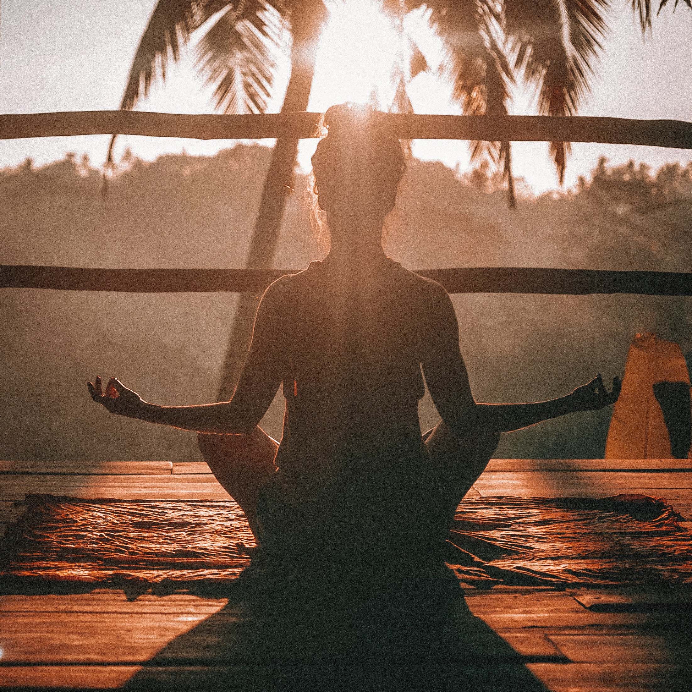 Meditating within the peace of nature - Blue & Bear essential oil products can elevate everyday moments